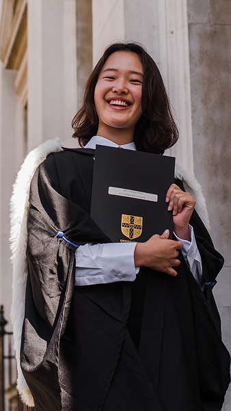 Student graduating outside Senate House